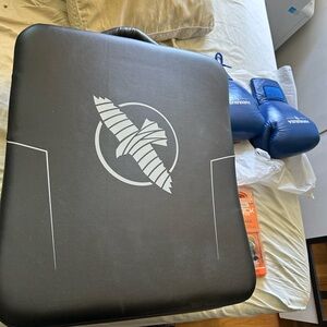 Black Training Pad with Blue Boxing Gloves